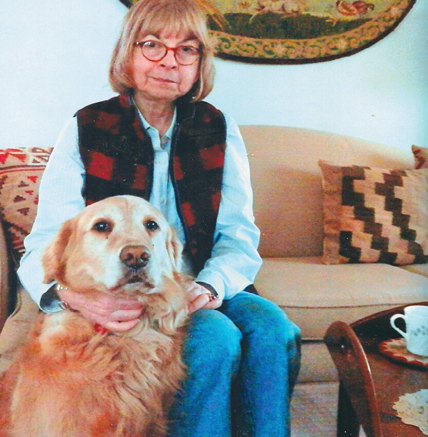 Catherine &ldquo;Cassie&rdquo; Frazer, with Bonnie, her Golden Retriever, in their home across the street from Pastorius Park. Frazer  was an extraordinary painter of life-like pet portraits.