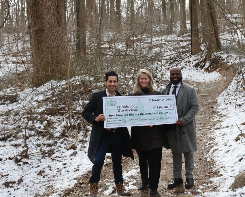 Friends of the Wissahickon (FOW) was recently awarded $356,000 in grant funding from the Pennsylvania Department of Environmental Protection&rsquo;s Growing Greener Program for its ongoing $1.2 million Pachella Gully Restoration and Sedimentation Reduction Project.    In partnership with the Philadelphia Water Department (PWD) and Philadelphia Parks &amp; Recreation (PPR), FOW is restoring the actively eroding 500-foot gully along an access trail behind Pachella Ball Field in Wissahickon Valley Park. Since the gully was first identified with PWD a decade ago, erosion has worsened substantially. Environmental engineers estimate that 22,000 pounds of sediment and 34 pounds of phosphorus are being discharged from the Pachella gully into the Wissahickon Creek each year.   Presenting the ceremonial grant check to FOW&rsquo;s Executive Director Ruffian Tittmann are State Rep. Tarik Khan (left) and DEP Communications Director Wallace Weaver.