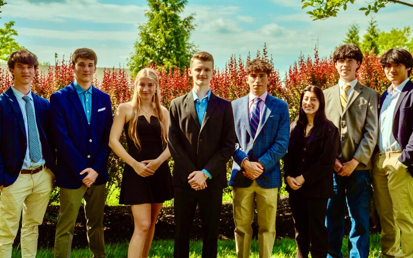 Team members of Dahlgren Social Media Services are, from left, Owen Quinn, Daniel Gendron, Clara Farrell, founder Asher Dahlgren, Matthew Hay, Ava Pastore, Kazuya Kiguchi and Justin Whang. All are students at Springfield Township High School  except for Pastore, who attends Haverford High School.