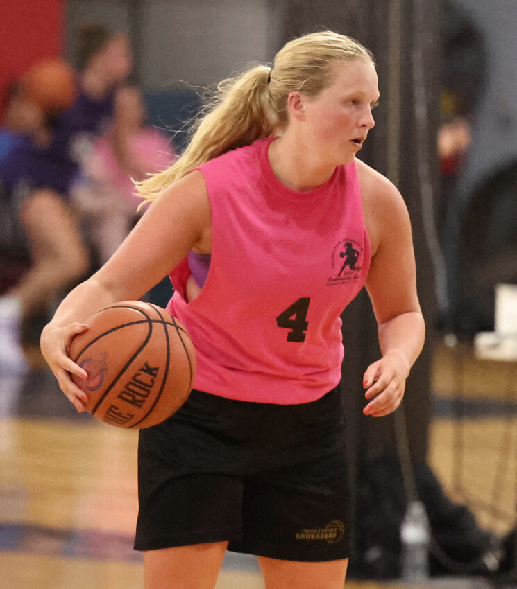 Chestnut Hill College alumna Lauren Crim scored 13 points for first-place Team Cyber Pink in their quarterfinal victory.