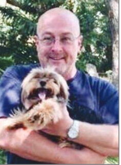 Chestnut Hill film animator John Serpentelli, who directed 100 short films for networks such as Nickelodeon, HBO, PBS and Sesame Street, is seen here with his sister's dog, Boo, who was named for a legendary character in &ldquo;To Kill A Mockingbird.&rdquo;