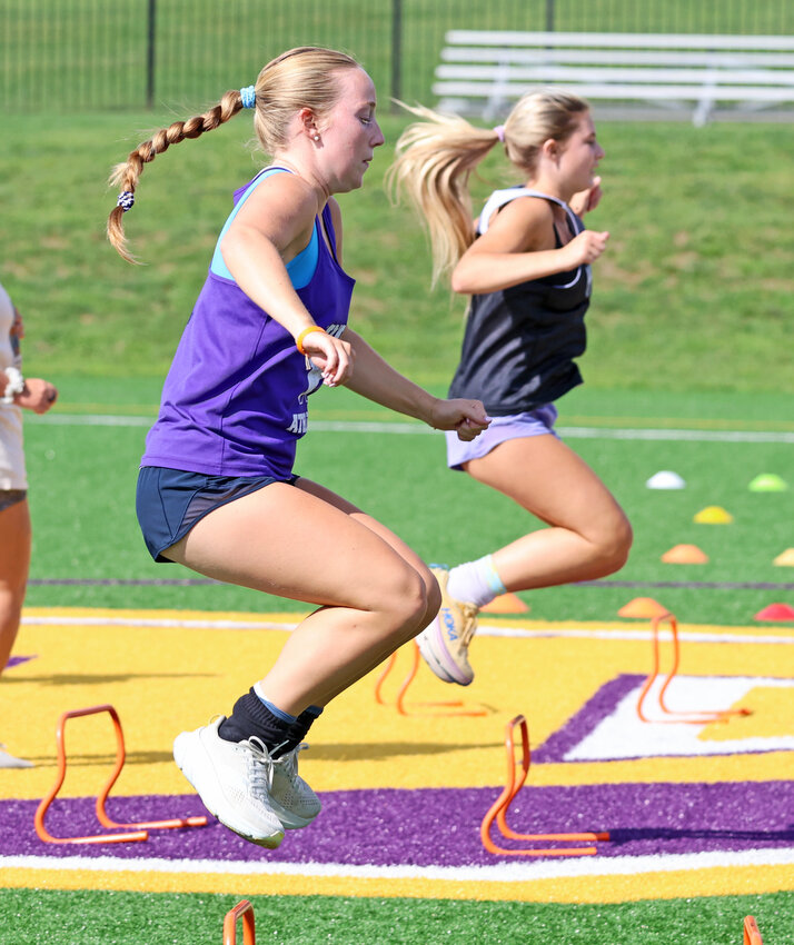 Mount hockey players Sara Burman (foreground) and Olivia Esbensen perform agility drills during a recent practice.