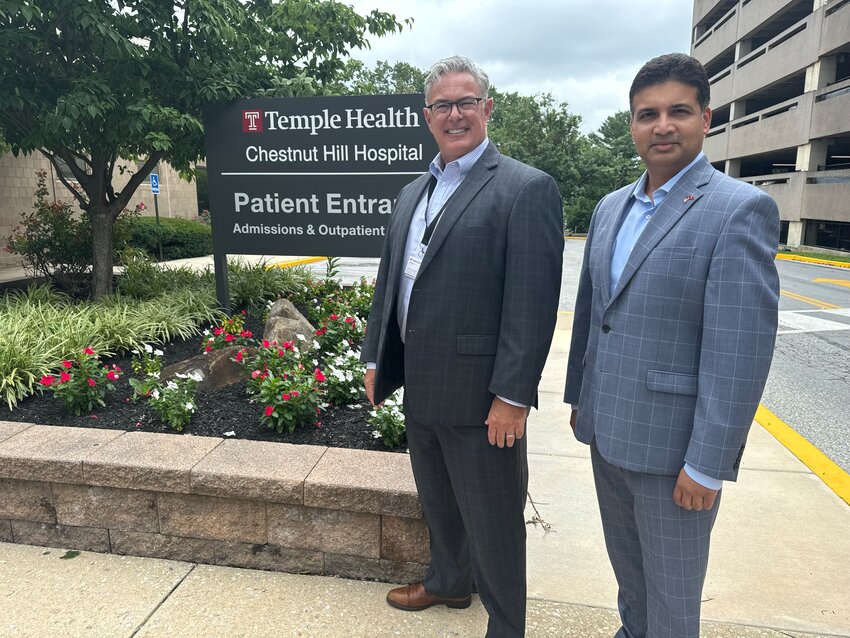 Richard Newell, president and CEO of Temple Health-Chestnut Hill Hospital (left), and Abhi Rastogi, president and CEO of Temple University Hospital.