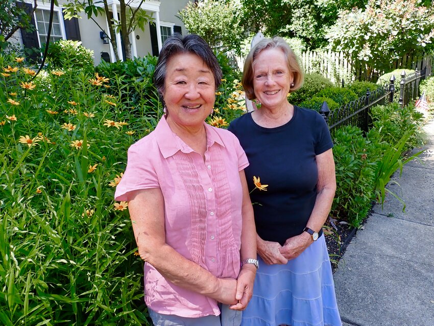 Teresa Maebori, left, of Mt. Airy, and Barbara Wybar, of Chestnut Hill, will be leaving on Sept. 5 from Northwest Philadelphia to drive about 3,000 miles across the country to Seattle. Maebori is moving to the Far West, where her family was put in an internment camp during World War II because they were Japanese-Americans.