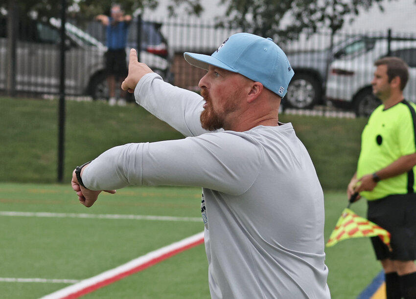 New SCH head coach Aaron Tritch directs his team during last Friday's scrimmage.  (Photo by Tom Utescher)