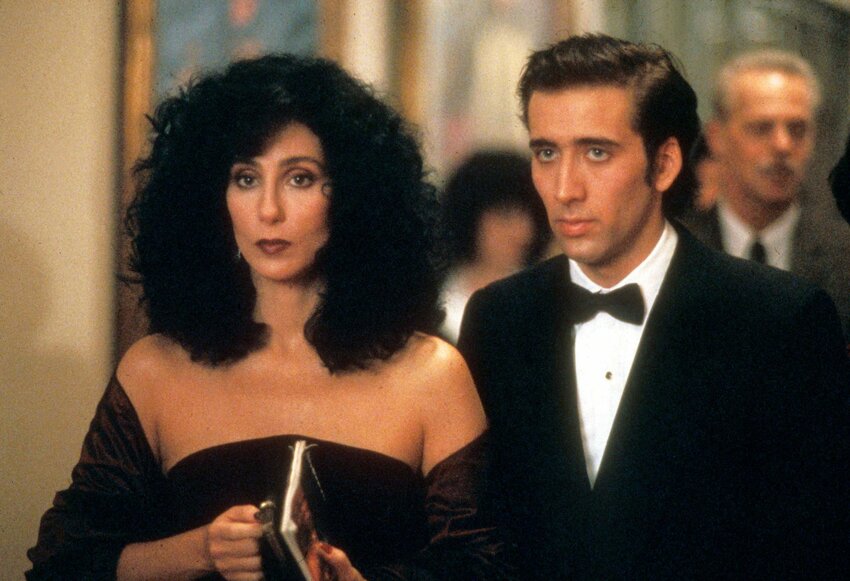 Ronny (Nicholas Cage, right) convinces Loretta (Cher) to join him for a night at the opera.