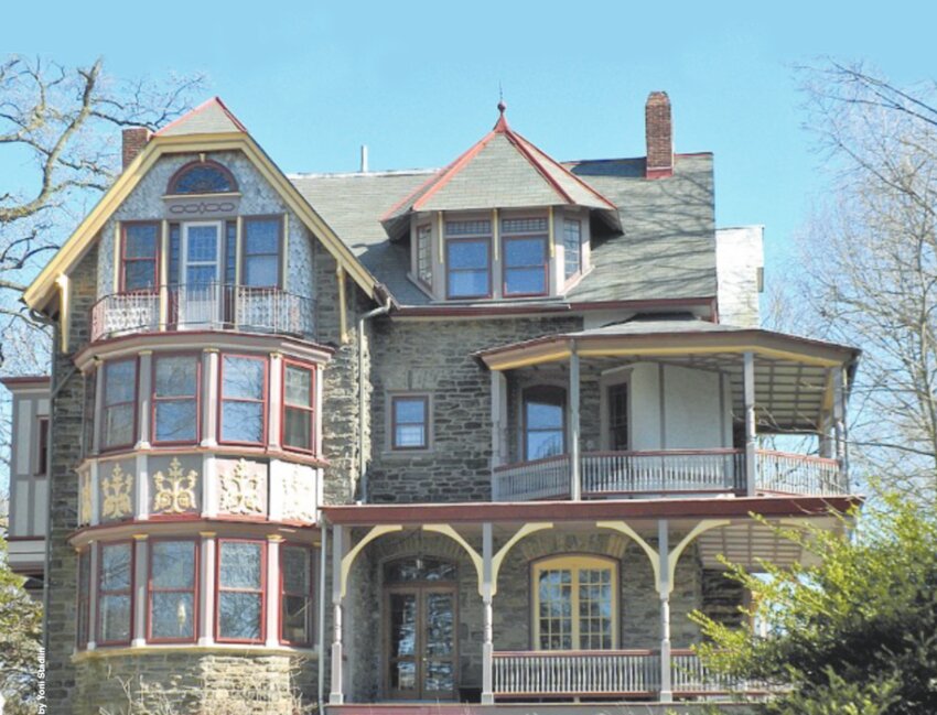 258 West Tulpehocken Street, designed by the Hewitt Brothers in 1886. The group of similar houses nearby were constructed at the same time as the Saveur House in Chestnut Hill.