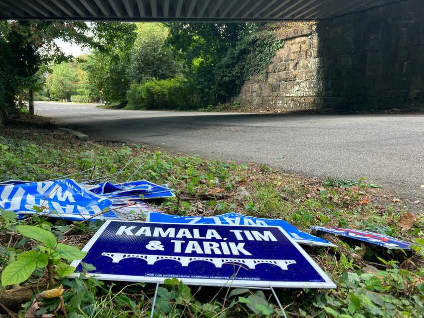 Stolen Kamala Harris campaign signs dumped under a train bridge near SEPTA&rsquo;s Highland Avenue Station.