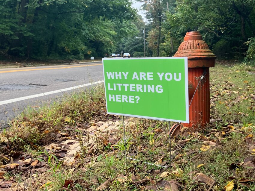 Smart-aleck sign writer condemns litter on Cresheim Valley Drive.