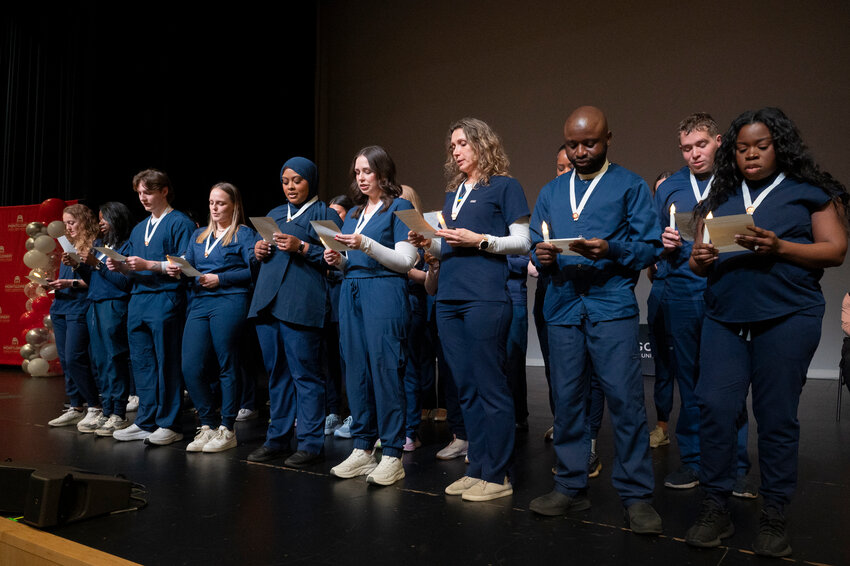 New nursing graduates at Montgomery County Community College take their oath.