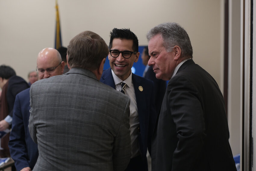 State Rep. Tarik Khan speaks with committee members after his bill, focused on protecting healthcare workers from surgical smoke, passed through the Health Committee on Jan. 29. Surgical smoke consists of byproducts from heat-generating instruments such as lasers and ultrasonic scalpels.