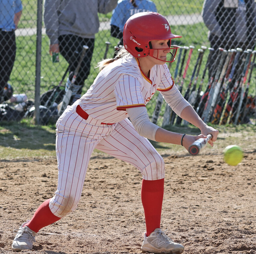 Giselle McLaughlin, a CHC sophomore, positions her bat for a bunt.