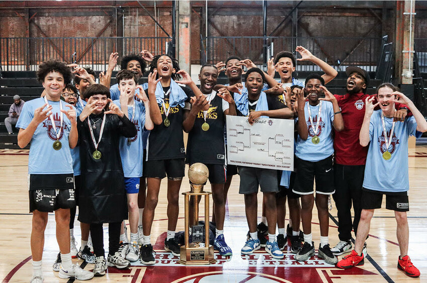 The team celebrates its championship.