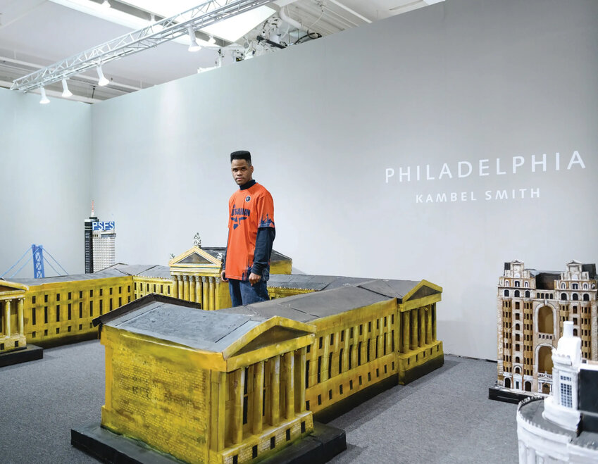Artist Kambel Smith stands amid his sculpture of the Philadelphia Museum of Art on exhibit in 2019 at the Outsider Art Fair in New York.