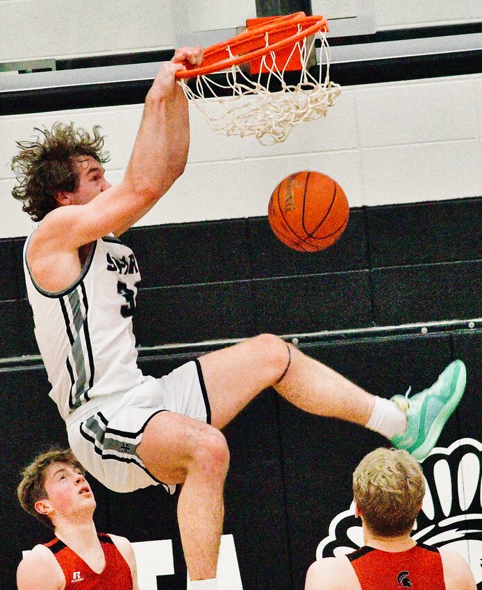 SPARTA'S JAKE LAFFERTY dunks for two of his 41 points Tuesday.
