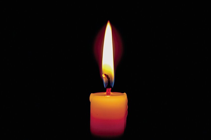 Memorial candle, obituary and funeral