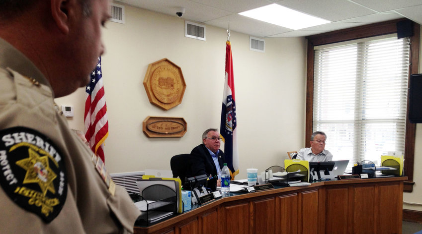 From left, Christian County Sheriff Brad Cole, Presiding Commissioner Ralph Phillips and Western District Commissioner Hosea Bilyeu at an emergency commission meeting held March 25, at the Christian County Historic Courthouse.