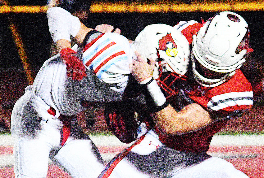 NIXA&rsquo;S CODY BREEDEN stops a Webb City ball-carrier at the goal-line two weeks ago.