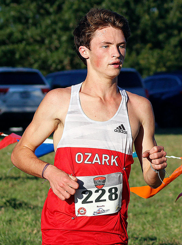OZARK&rsquo;S GABE BAUER races toward a third-place finish at the COC Meet.