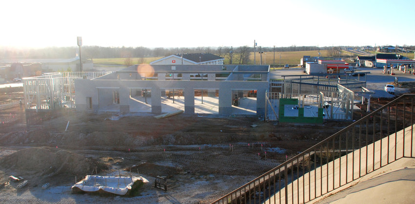 THE DECEMBER SUN SETS on the work site of the new Christian County Ambulance District headquarters in Ozark, just to the southwest of the U.S. Highway 65 interchange with Highway 14.