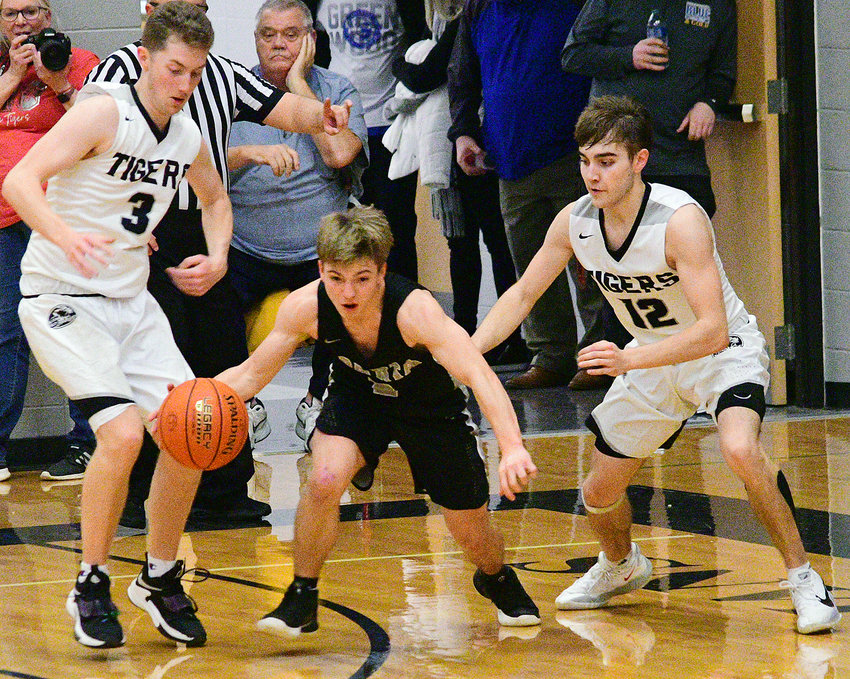 SPARTA&rsquo;S WALKER LOVELAND beats Skyline pressure in Class 3 District 11 semifinal action Tuesday.