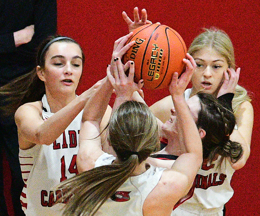 CHADWICK&rsquo;S LEXI LOVELAND, CORA MICHAEL AND RAELEIGH LITTLE surround a Niangua ball-handler at Districts.