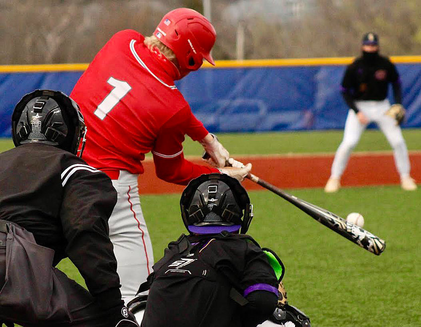 NIXA&rsquo;S JARET NELSON connects at-bat against Columbia Hickman.