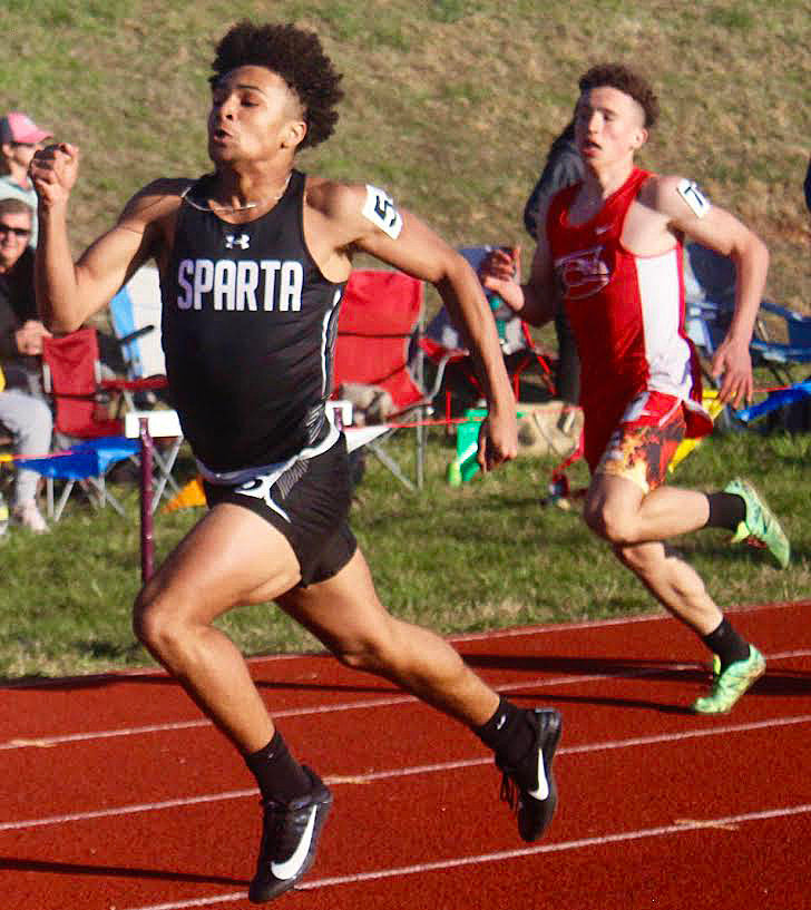 SPARTA&rsquo;S LEE MAYES bolts to a first in the 200 ahead of Chadwick's Tristen Jones at the Spokane Relays.