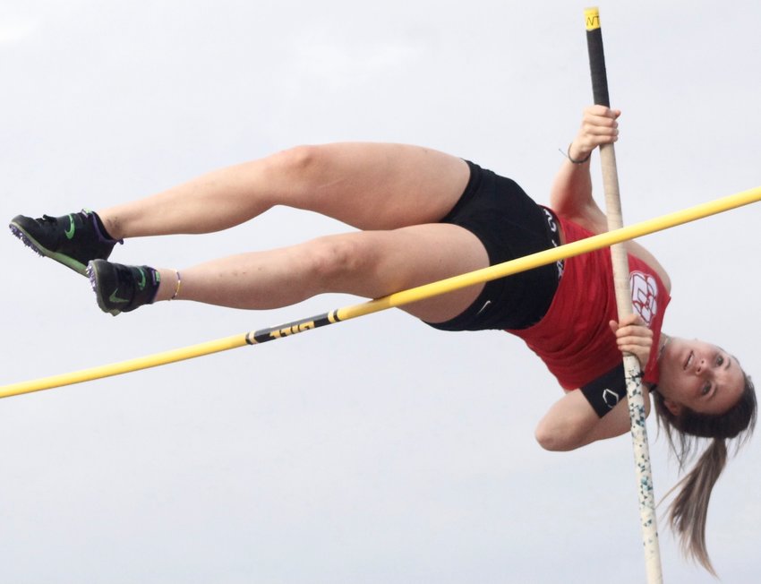OZARK'S ABBY BEETS sails over the bar en route to winning the pole vault at last week's Nixa Relays.