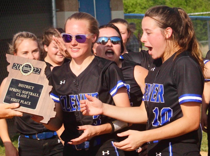 CLEVER'S KENNA WISE AND KYLIE WENGER receive the Class 2 District 5 championship plaque Wednesday.