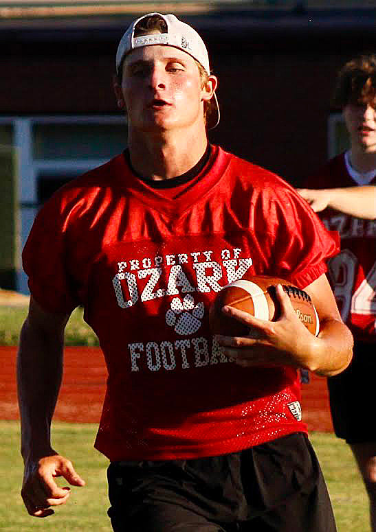 OZARK&rsquo;S BROCK DODD runs downfield with the ball following an interception during 7-on-7 action last week.