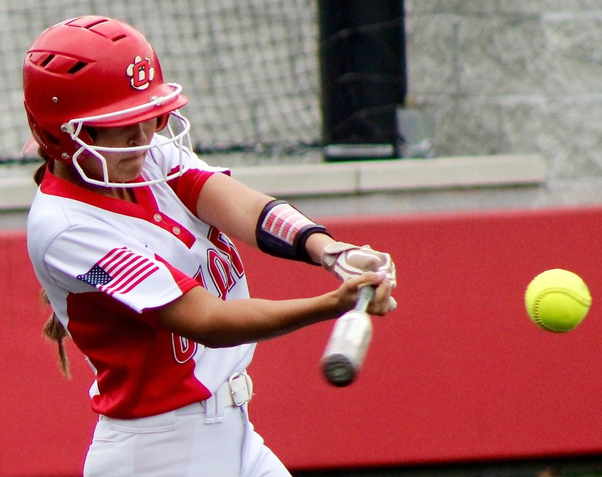 OZARK'S KARISSA ROBERTS connects for a hit in Class 5 District 5 action Tuesday.