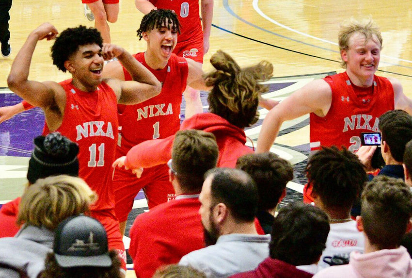 KAEL COMBS, COLIN RUFFIN AND JARET NELSON celebrate Nixa's berth to State.