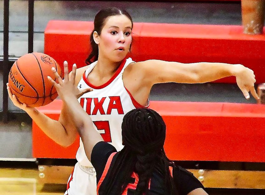 NIXA'S SADIE CONWAY directs traffic against Jefferson City on Wednesday.