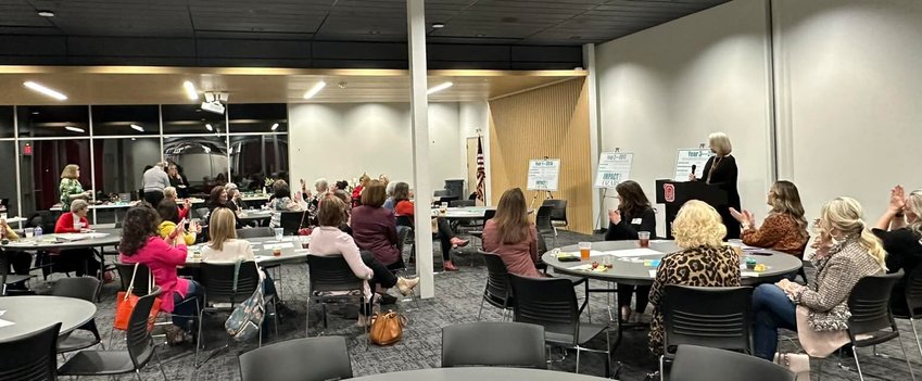 Attendees of a Feb. 13 meeting heard speakers encouraging them to join Impact 100 Ozark during 2023.