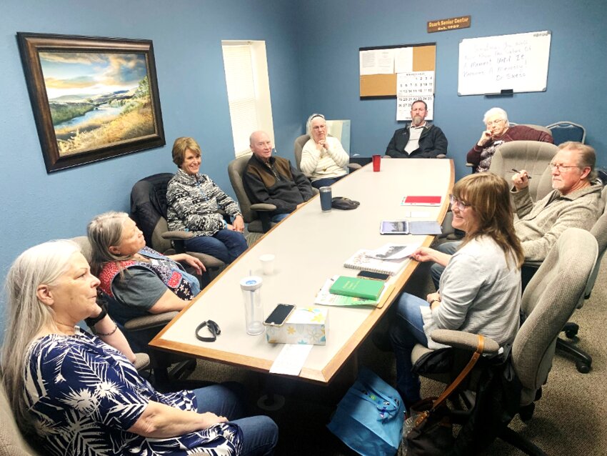 Pictured: Marcia Temple, Treva Eubanks, Debi Achor, Bill Achor, Jeanie Wright, Joe Scott, Imogene Knell with the Ozark Senior Center; resident artist Larry Waggoner; Suzan Collins with Ozark&rsquo;s Historic River District. Not pictured: Debby Spencer and Ashleigh Hawkins with Ozark&rsquo;s Historic River District.