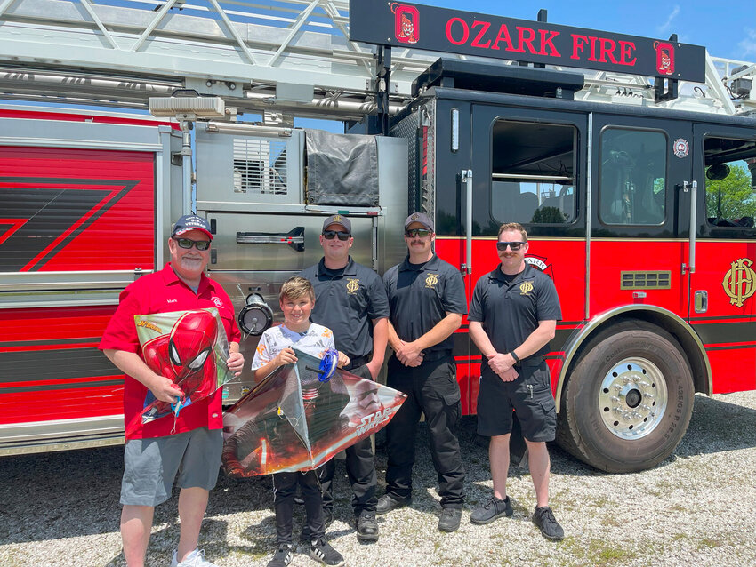 From left: Elks Mark Connacher (Ozark) with Crewe Lindemann (Nixa) and Ozark Firefighters Matt Garrison, Cory Fasone and Derek Compton.