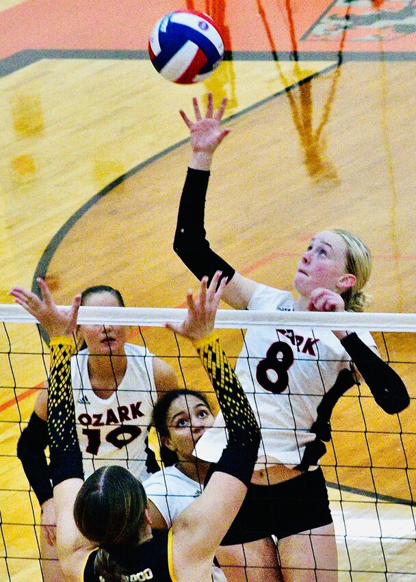 OZARK'S SKYLAR HILTON attacks at the net against Kickapoo on Tuesday.