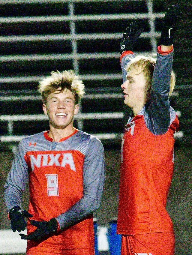 NIXA'S LUCAS GREEN celebrates a goal Monday with teammate Gavin Ward.
