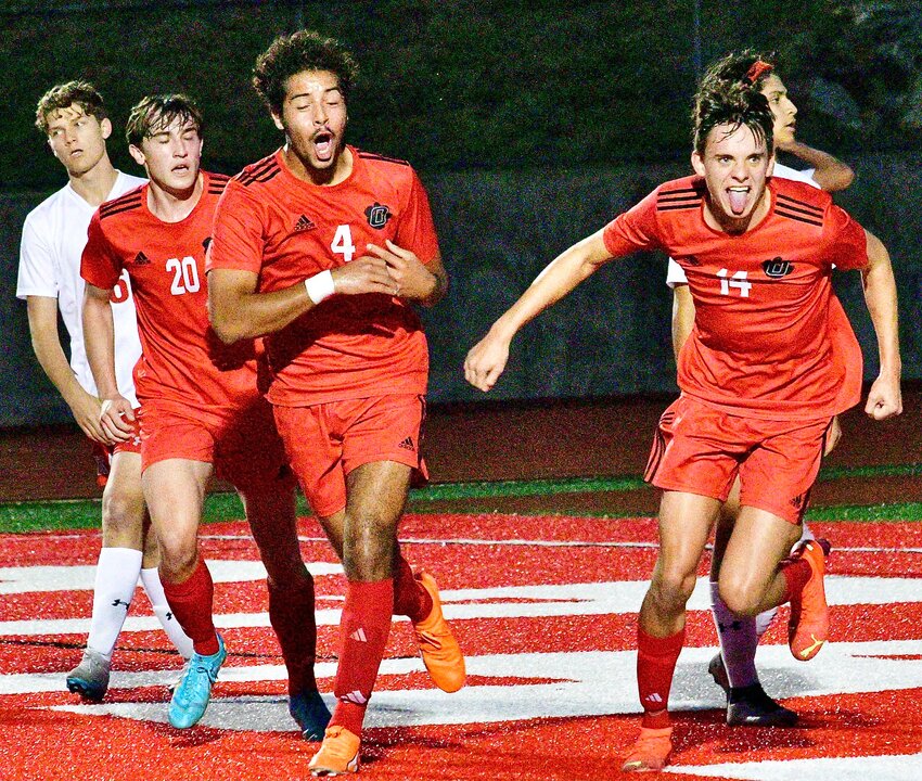 OZARK'S JAKE GARNER reacts after netting a goal in Monday's Class 4 District 5 final.