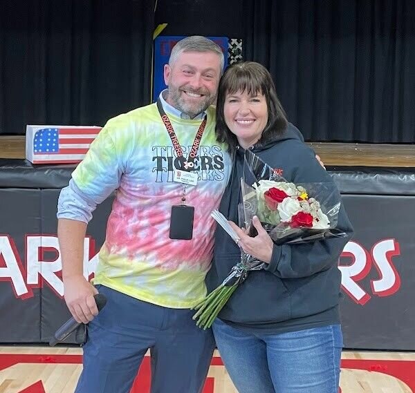 Master Sergeant Nicola Mozingo, who is retiring from teaching and the military at the end of the school year, is pictured with Ozark Junior High Principal Dr. Philip Link.