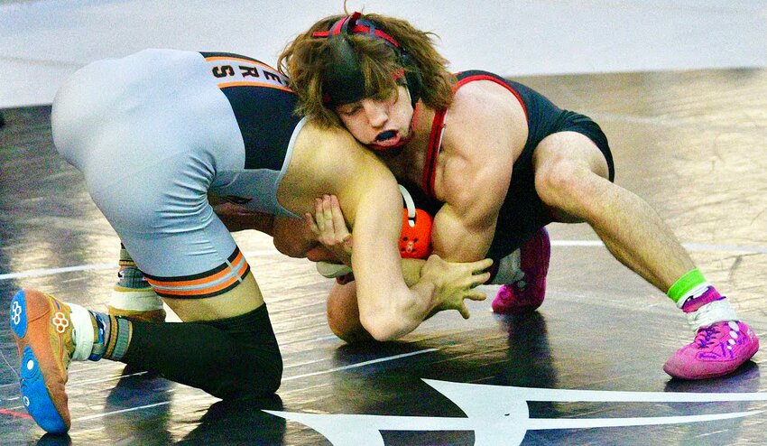OZARK'S DAMIEN MOSELEY applies pressure on his opponent at 126.