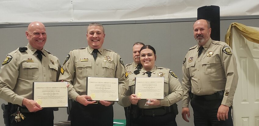 Christian County Sheriff Brad Cole, right, pictured with Ozark school resource officers, from left, Steve Hoerning, John Wilkerson and Amanda Fry-Ryan, who each received a Service Award.