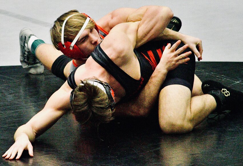 NIXA'S MALACHI RIDER works on top during the COC Tournament.