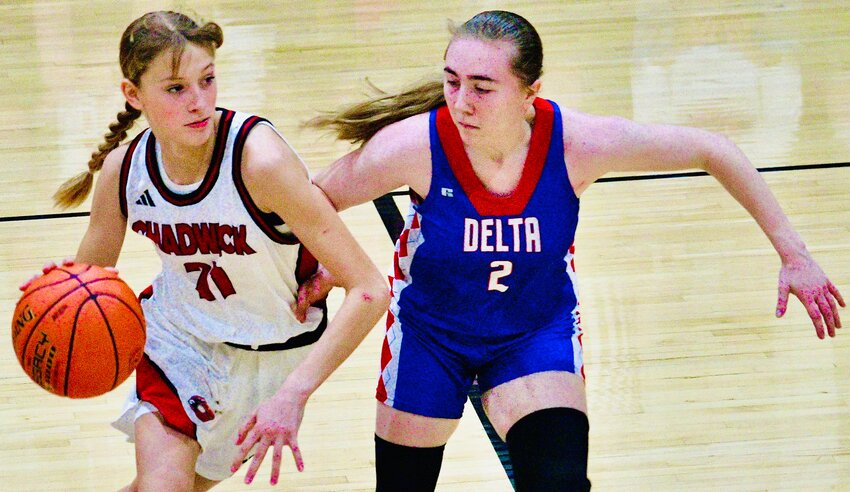 CHADWICK'S EMILY LANDRY dribbles along the perimeter while defended by a Delta player Monday.