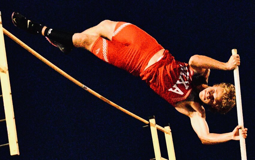 NIXA'S AFTON HOPKINS clears the bar at the Branson Relays.