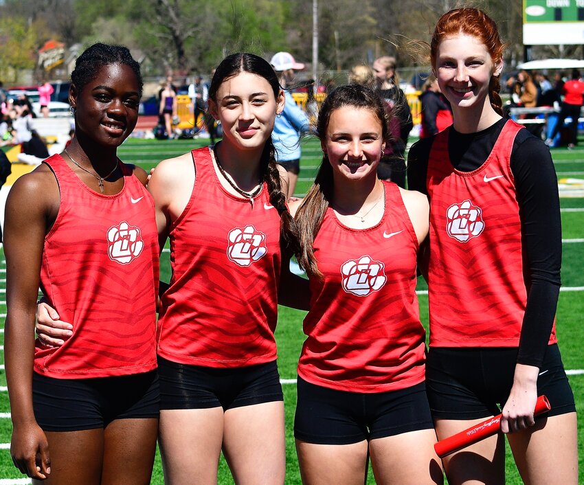 OZARK'S 4 X 200 RELAY is made up of (l-r) Jeneba Pyle, Ileana Naihe, Shelby Middleton and Bria Wright.
