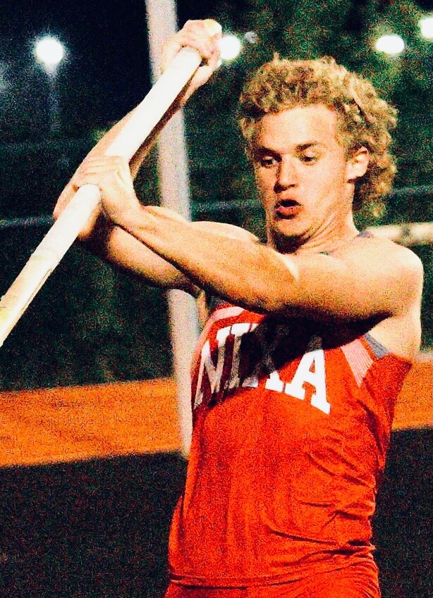 NIXA'S AFTON HOPKINS took first in the pole vault at the COC Championships.
