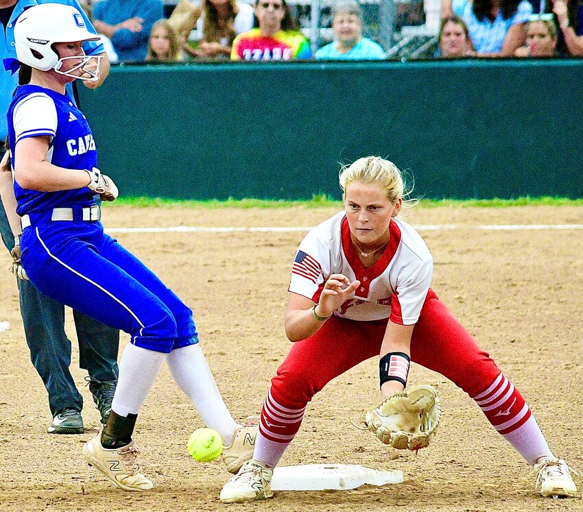 OZARK'S KELSIE BATEY awaits a throw at second base from the outfield.