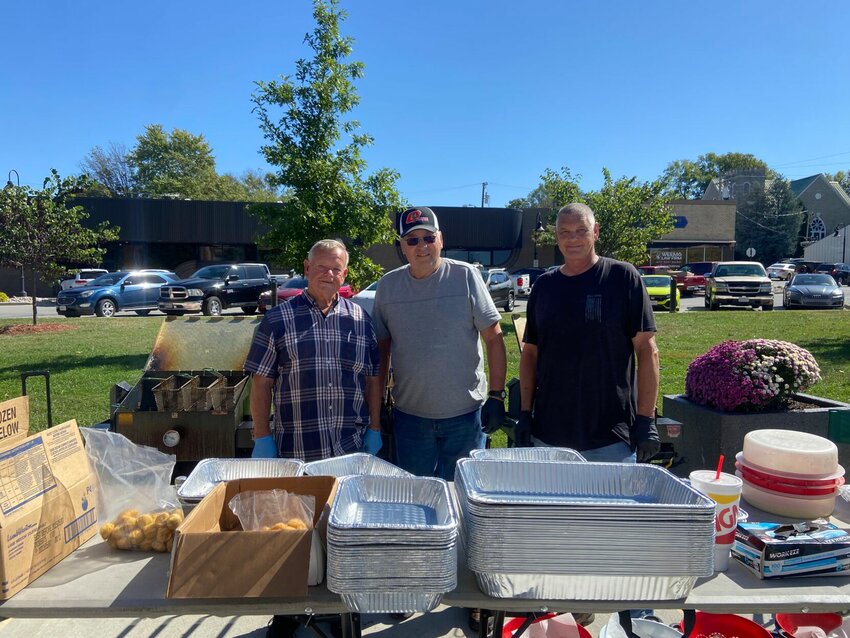 From left: Harry Treece, Max Thomas and Clint Ryan serve up the fish fry for the Christian County Employee Appreciation Lunch on Oct. 2, 2024.